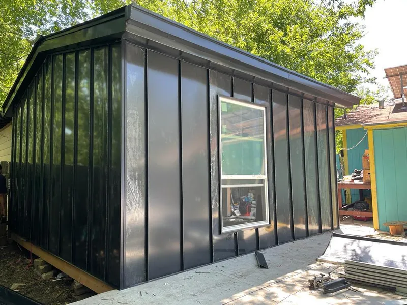 Black standing seam metal wall panels for Roof Inspection in Radford