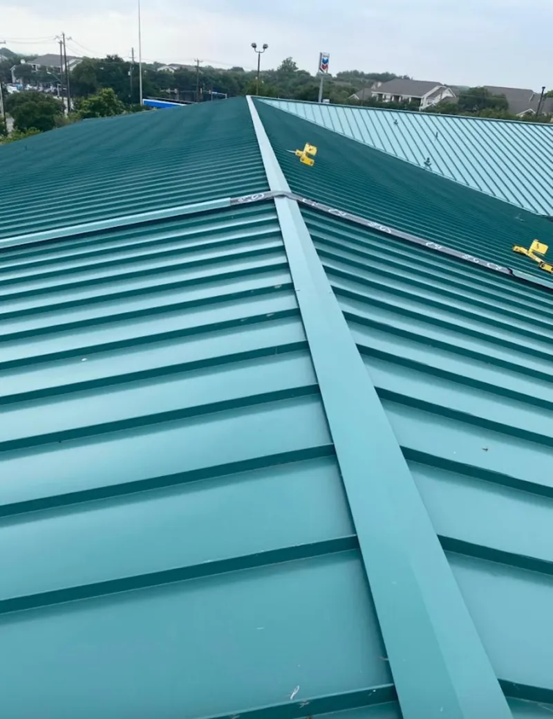 Green commercial metal roof ridge and valley for Metal Roof Repair in Radford
